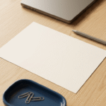 Blank sheet of paper and pen on a desk, representing writing an AI governance policy for a business